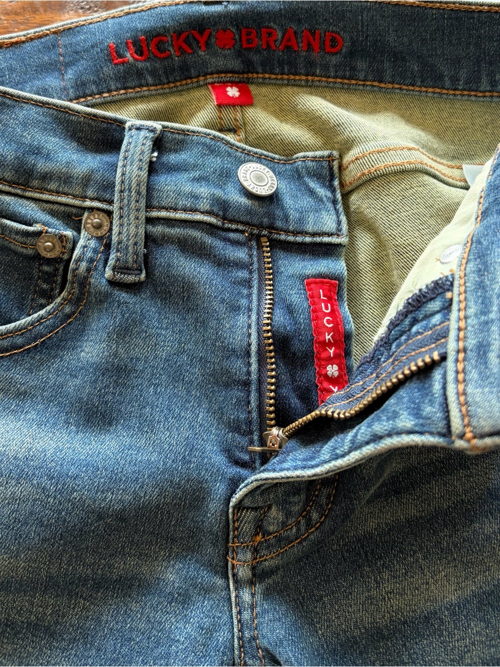 Lucky Brand Ava Mid Rise Blue Denim Slim Jeans with Red Logo Tab. Size 00, 24.